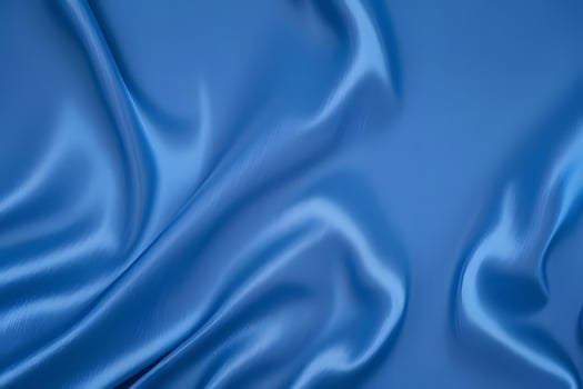 Serene Blue Silk Drape A Study in Texture for backgroundfor backgroundand Light Background. photo