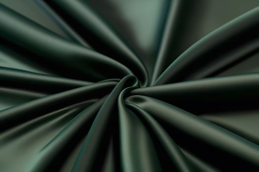 Elegant Dark Green Satin Fabric Drape, Luxurious Texture and Smooth Surface, Deep Emerald Green Color, Close-Up Shot photo