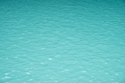 Turquoise water from limestone waterfall. photo
