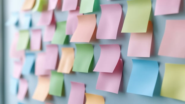 A wall covered with sticky notes photo