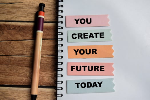 Concept of You Create Your Future Today write on sticky notes isolated on Wooden Table. photo