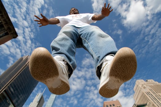 A man wearing white sneakers photo