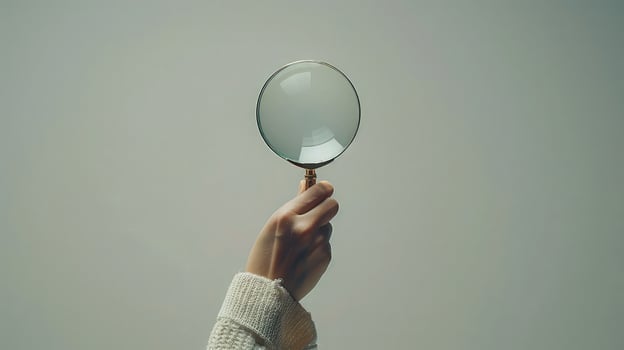 Graceful curiosity exploring with magnifying glass. photo