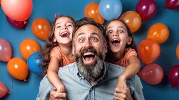 Happy father with two daughters and balloons photo
