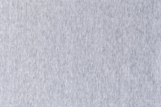 Light gray heather fabric texture as a background, showcasing the intricate detail of the weaving pattern, suitable for textile and design projects photo