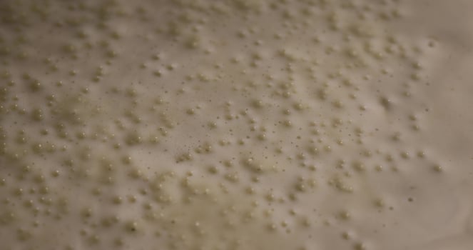 changing pancakes during their cooking in a hot pan photo