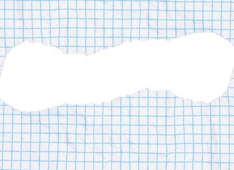 Piece of paper with a light blue grid pattern and a large, torn hole in the center. The paper has a slightly crumpled texture, torn edges are ragged. photo