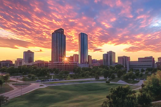 Vibrant sunrise illuminating the modern skyline of des moines, iowa photo