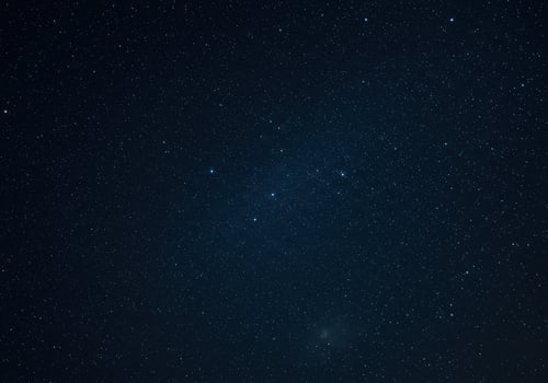 A breathtaking view of countless stars illuminating the vast, inky blackness of night. photo