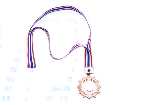 Victory medal with red white blue ribbon strip from competition, isolated on white background. Concept, symbol of win, award ,successful, pride and championship. photo