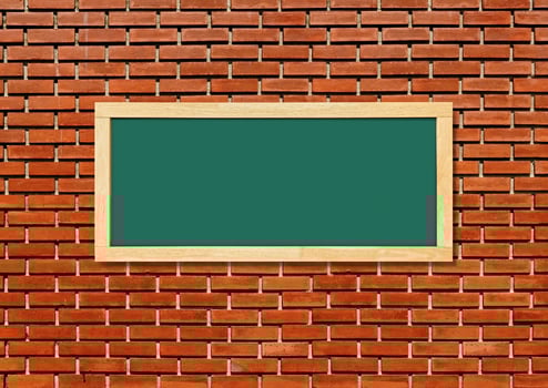Blank green chalkboard isolated on red brick wall background. photo