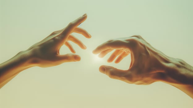 This Two hands reach for each other, symbolizing conflict, tension, and reconciliation. photo