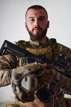 Modern warfare soldier portrait in urban environment photo