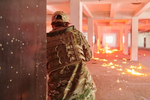 A group of professional soldiers bravely executes a dangerous rescue mission, surrounded by fire in a perilous building. photo
