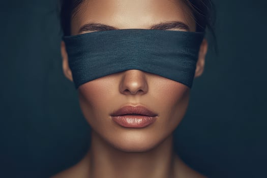 Woman with blindfold in dramatic portrait lighting photo