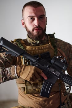 Modern warfare soldier portrait in urban environment photo