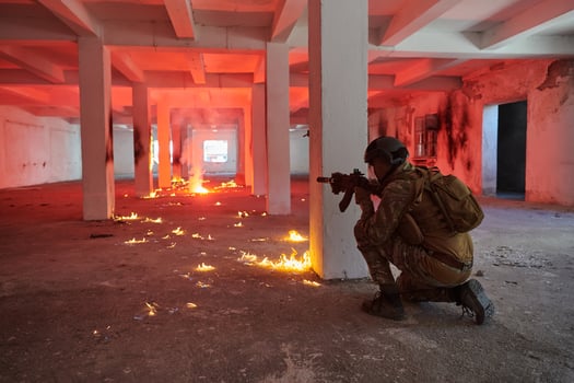 A group of professional soldiers bravely executes a dangerous rescue mission, surrounded by fire in a perilous building. photo