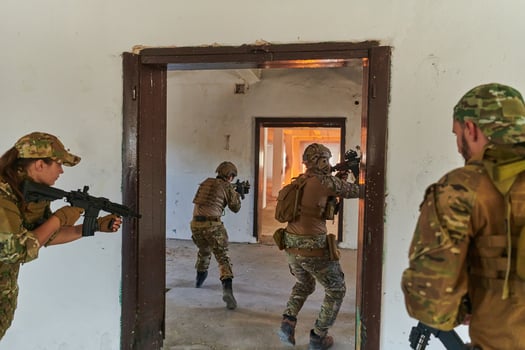 A group of professional soldiers bravely executes a dangerous rescue mission, surrounded by fire in a perilous building. photo