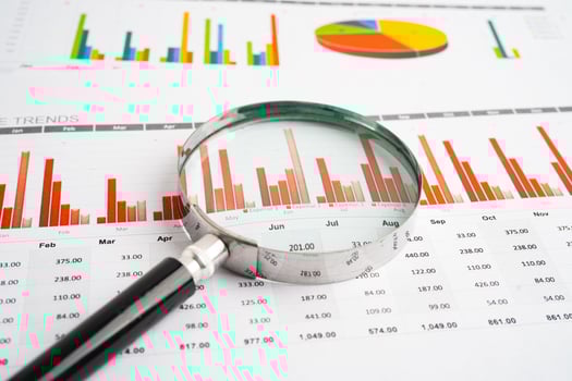 Magnifying glass charts photo