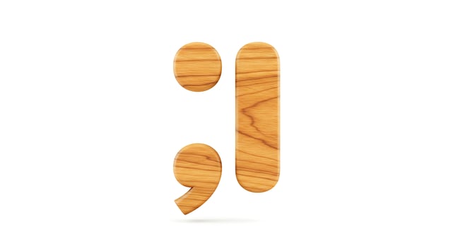 Wooden Semicolon Isolated on White Background - Punctuation and Style photo
