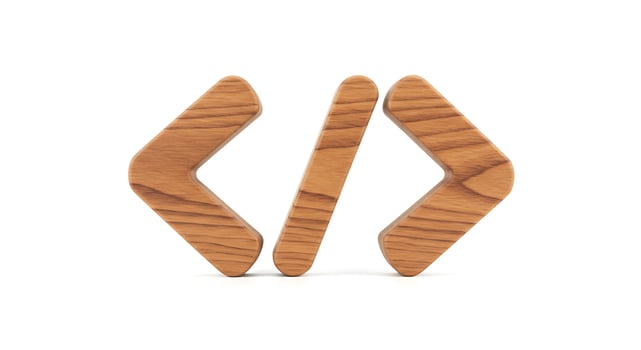 Wooden Code Symbols Representing Programming on a Clean White Background photo