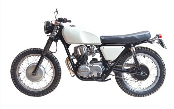 Custom vintage motorcycle parked on neutral background photo