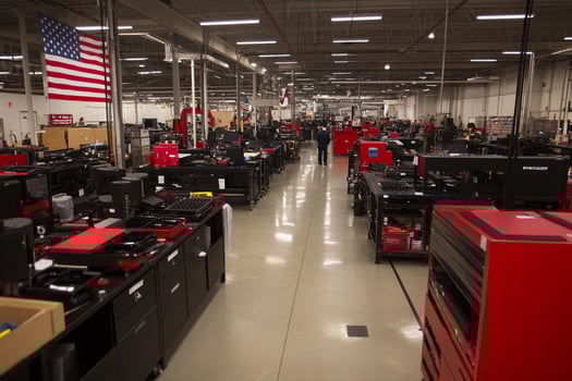 A large room with lots of machines photo