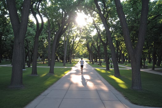 A person riding a skateboard down a sidewalk photo