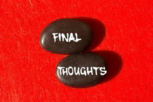 Final thoughts message written on black stones on red background. Conceptual final thoughts symbol. Copy space. photo