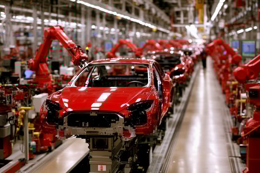A tesla car is being assembled on a production line photo