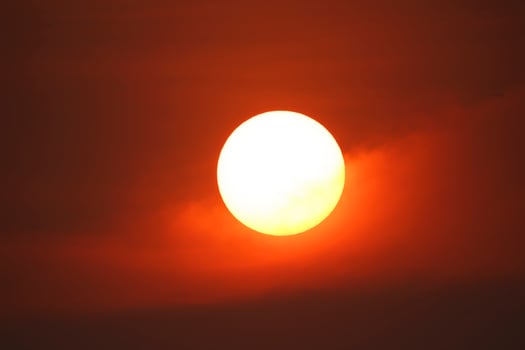 The summer evening sun was still shining in the sky. photo