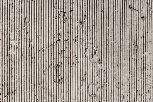 Rough concrete exterior background with vertical stripes photo