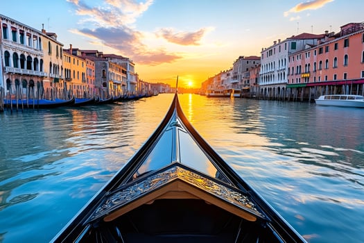 Gondola sailing on grand canal during sunrise in venice, italy photo