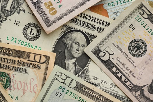 Stack of dollar bills. Hundred, fifty, twenty, ten, five dollars banknote close up photo