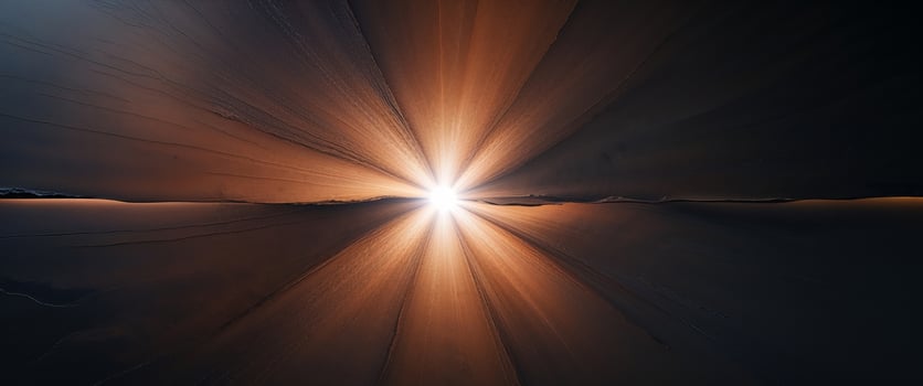 A dark background with a sunburst photo
