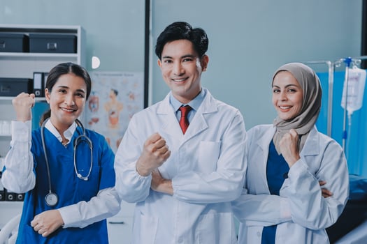 Asian doctor, nurse and patient in hospital photo