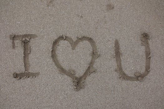 'I Heart U' Drawn in the Sandy Beach Shoreline Message photo