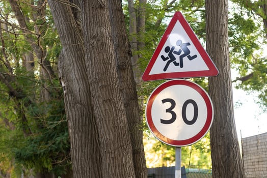Children crossing and speed limit sign photo