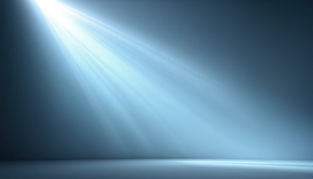 An empty room with a spotlight shining down on it photo