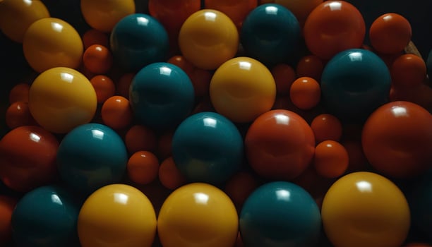 A bunch of colorful eggs are arranged in a pile photo