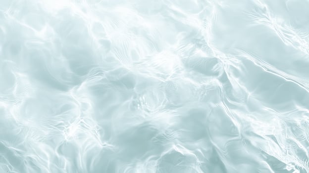 A smooth water surface featuring delicate wavy ripples and soft reflections photo
