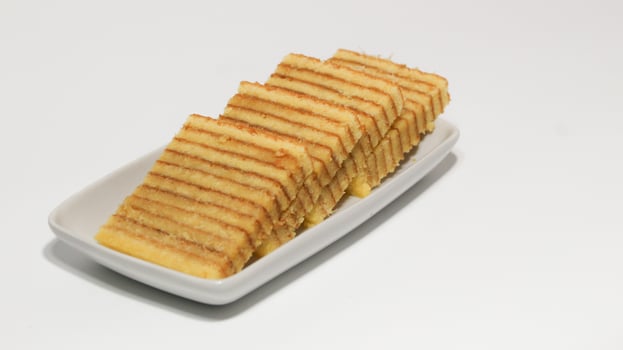 Several slices of Sweet and Sour Layer Sponge Cake with Pineapple Jam filling, Pineapple Jam Cake.. photo