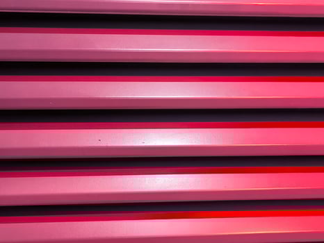 Full frame of Red door Metallic Stripes. grille photo