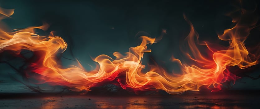 A close up of fire flames on a dark background photo