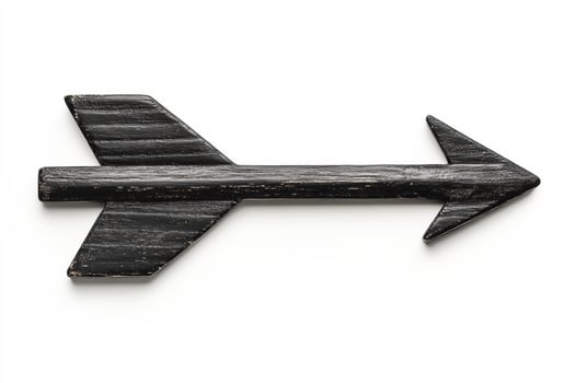 Wooden arrow sign with a rustic finish on a white background photo