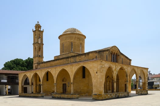 Historic stone architecture of Selimiye Mosque in the heart of Nicosia, Cyprus, under the bright summer sky photo