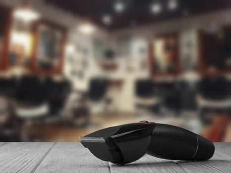 Hair clipper on the barber's table photo