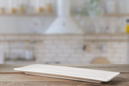 Rectangular plate on the kitchen table photo