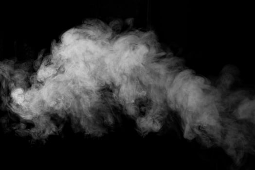 White smoke on a black background. photo