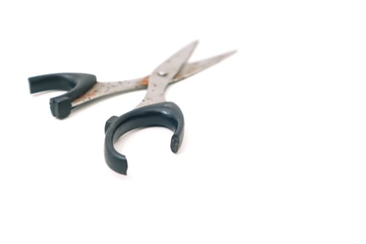Isolated Scissors on White Background Showing Rust and Handle Damage photo